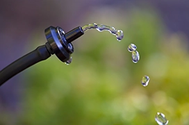 Water dripping from a nozzle.