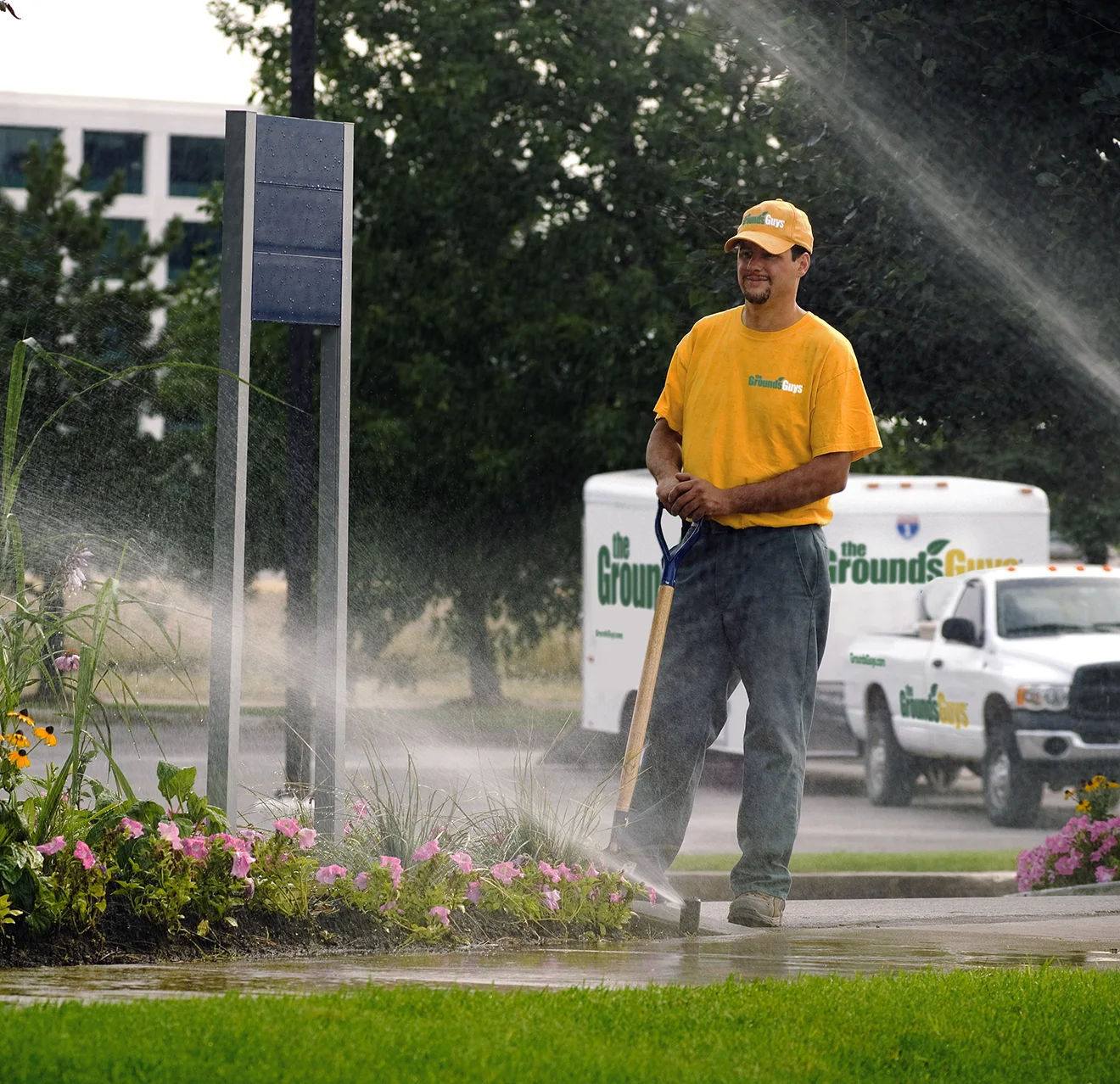 Guy employee near sprinkler.