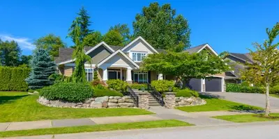 house on a street with stone landscaping